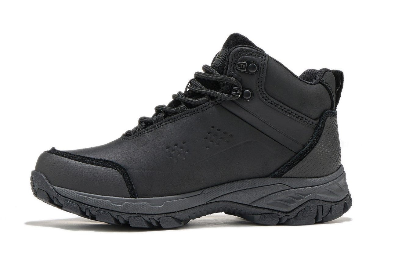Side view of black waterproof hiking boot on a white background.