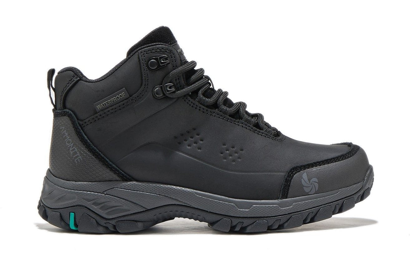 Women's black waterproof hiking boot, side view on a white background.