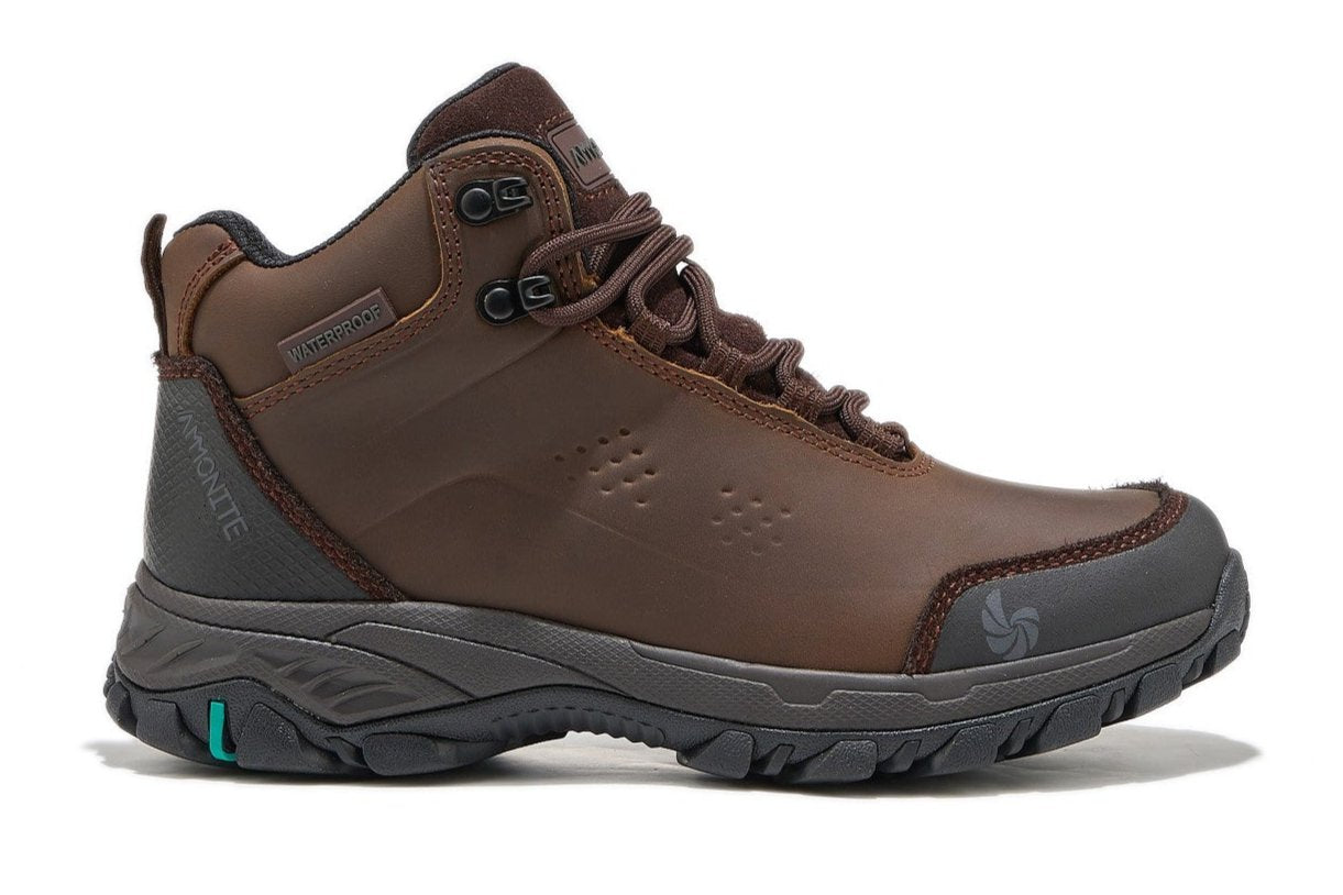 Brown hiking boot for women, side view on a white background.