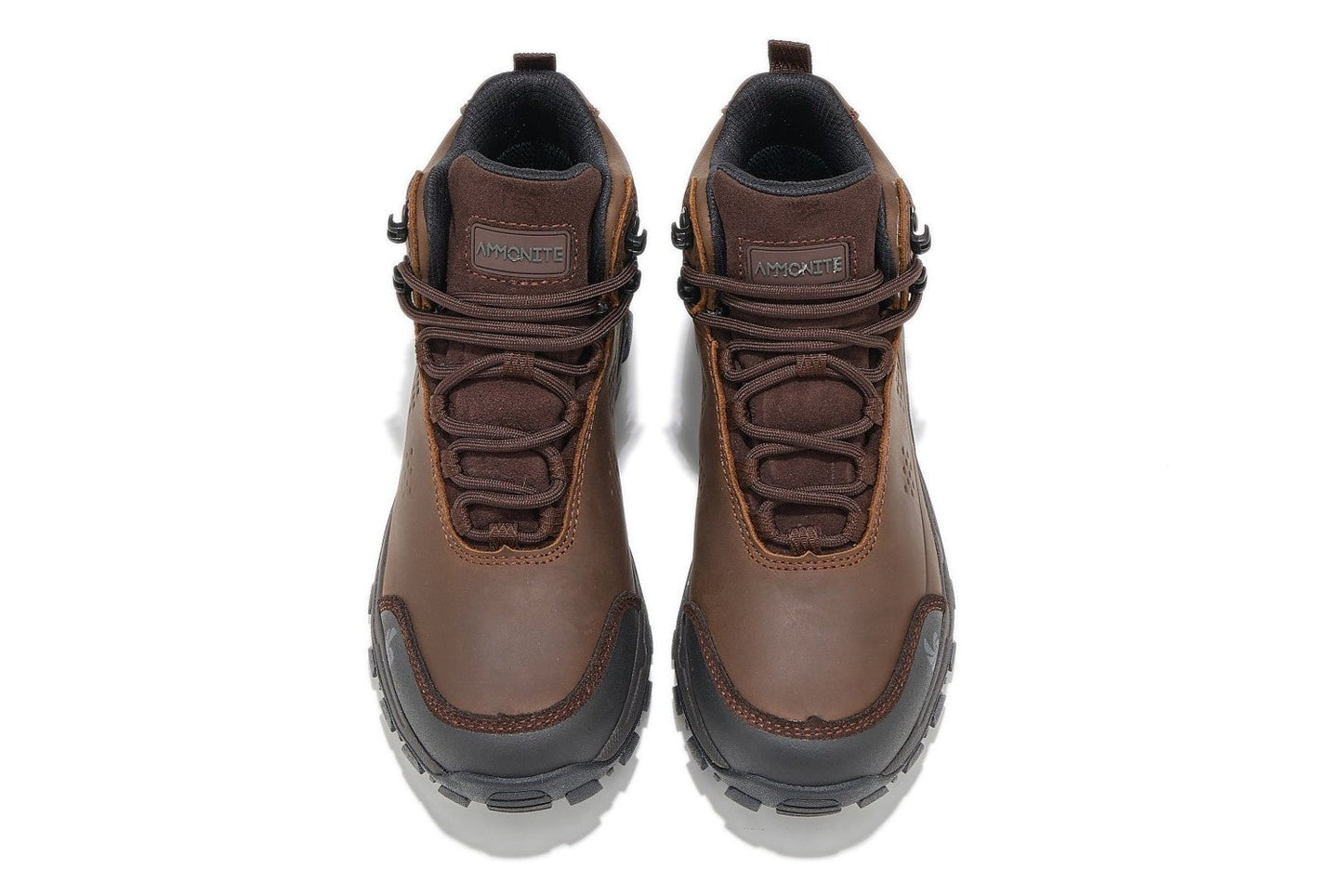 Top down view of brown hiking boots for women, showing stylsh design on a white background.