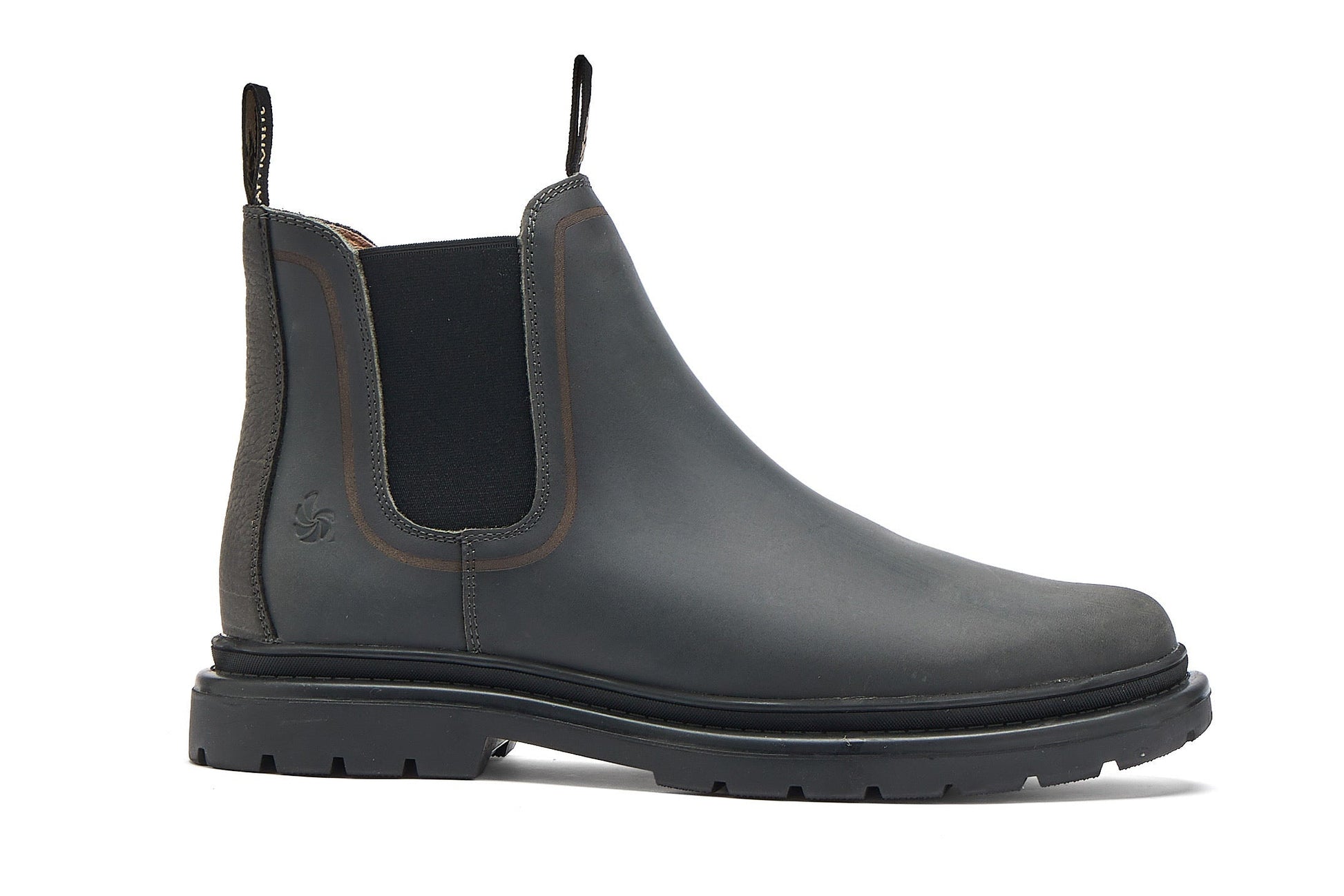 Dark grey chelsea boot on a white background