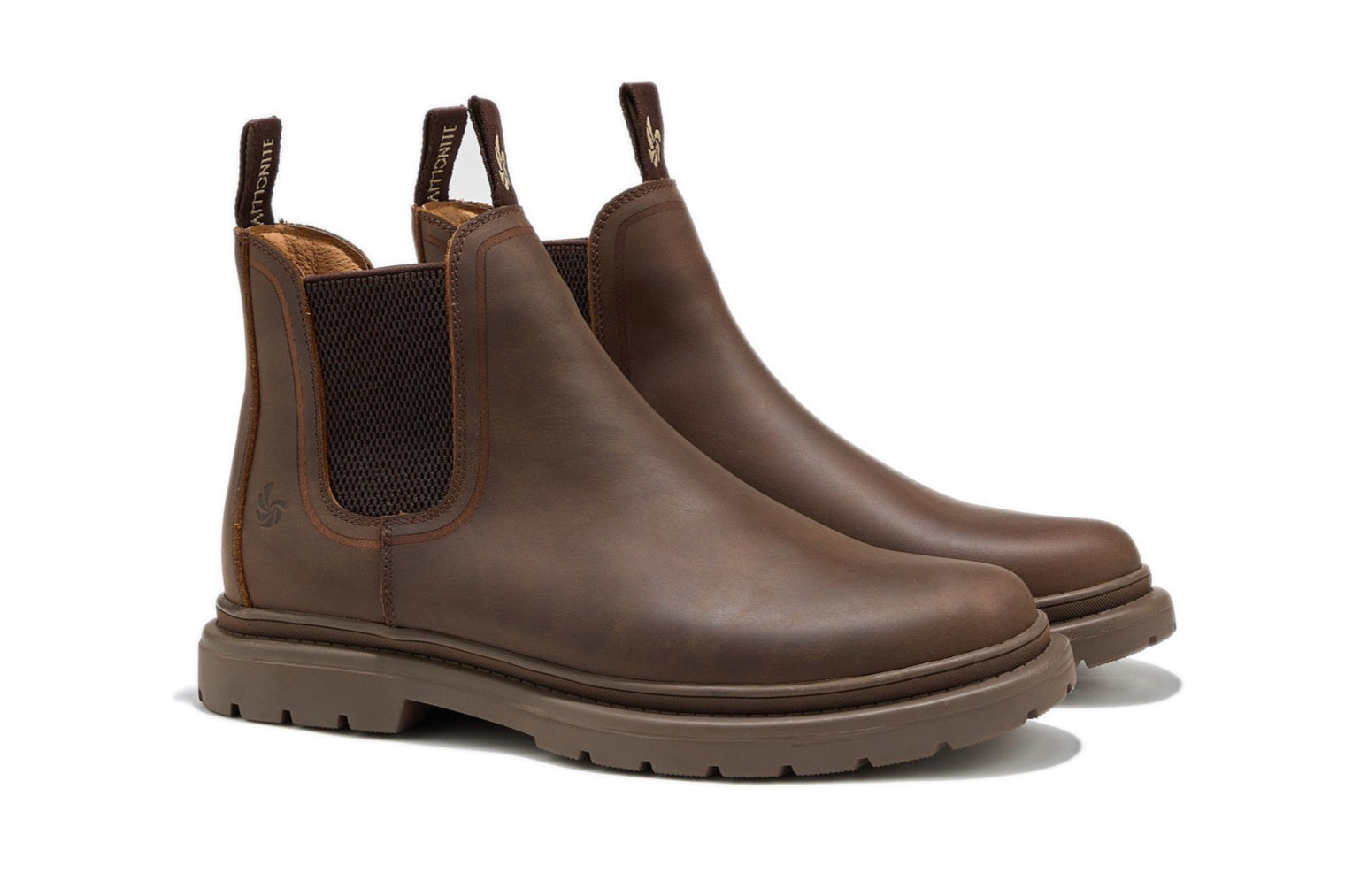 Men’s brown Chelsea boots, slightly angled front view on a white background.