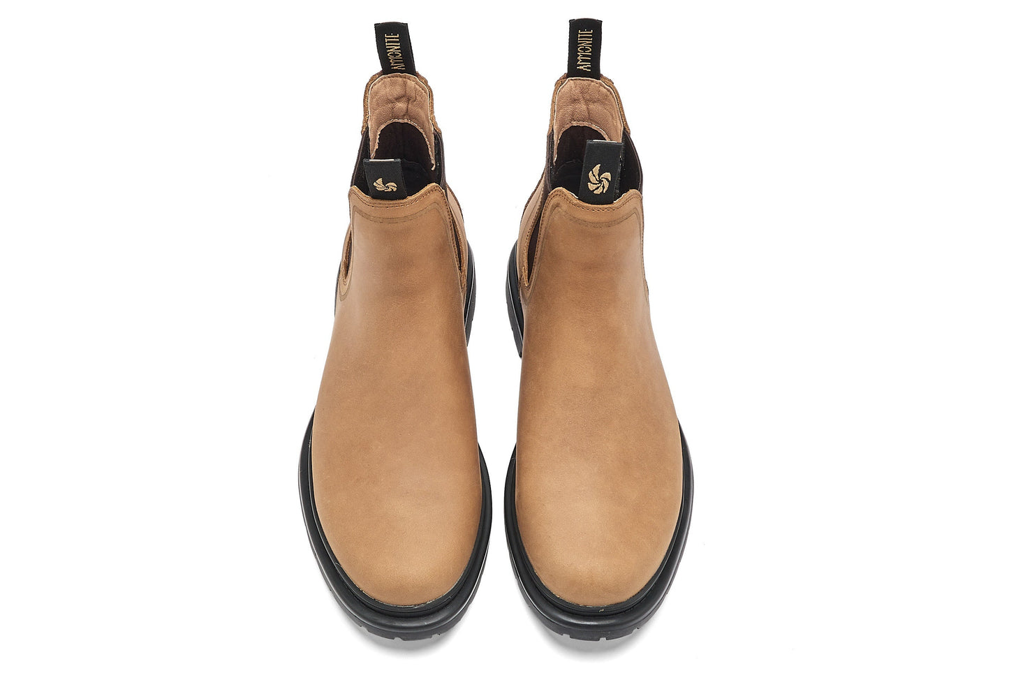 top view of chelsea boots on a white background