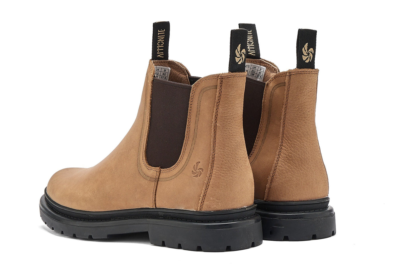 Back view of light brown chelsea boots on a white background